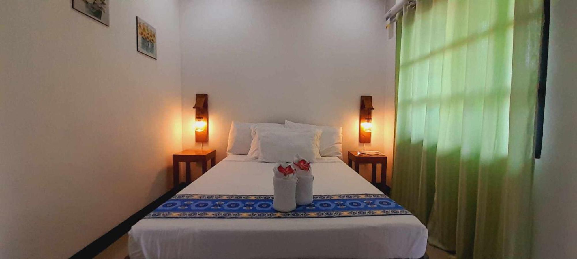 El Taraw Bed & Breakfast Puerto Princesa ภายนอก รูปภาพ